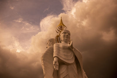 Low angle view of statue against sky during sunset