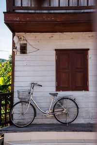 Bicycles parked against building
