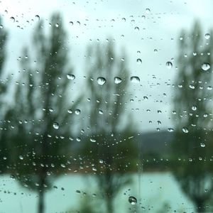 Close-up of water drops on glass