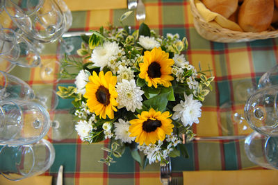 Sunflowers in vase on table