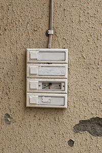 Close-up of mailbox on wall