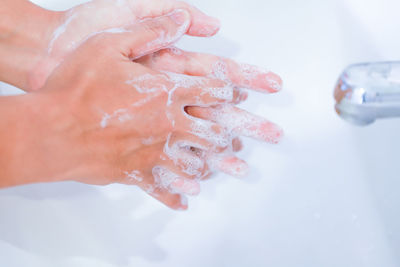 Close-up of hand holding hands