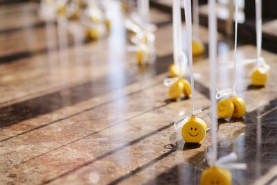 Close-up of yellow toy on table at home