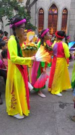 People standing on street in city