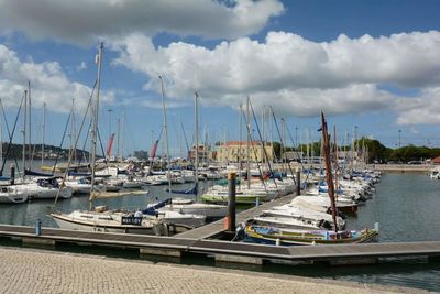 Boats moored at harbor