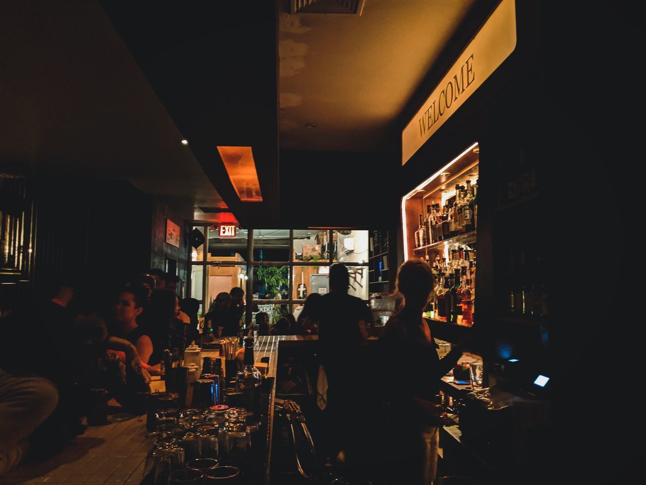 PEOPLE SITTING IN RESTAURANT