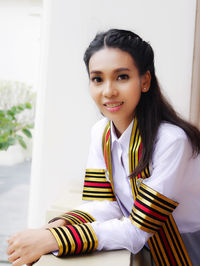 Portrait of smiling young woman