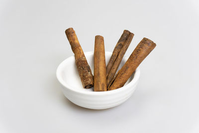 High angle view of bread on white background