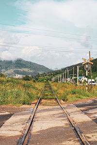 Railroad track against sky