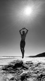 Full length of man on beach against sky