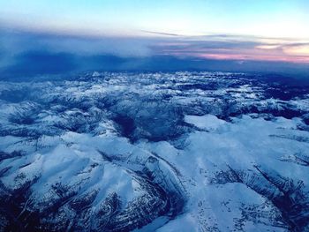 High angle view of frozen landscape against sky