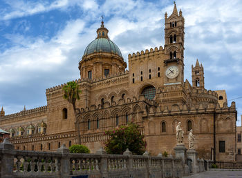 Low angle view of cathedral against cloudy sky