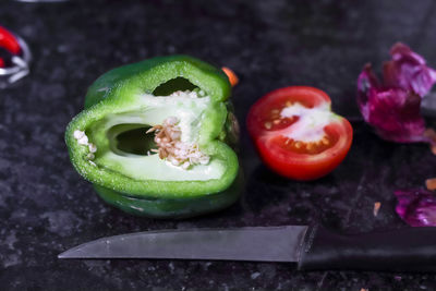 Close-up of fruits and vegetables on cutting board