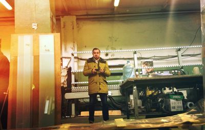 Man standing in kitchen