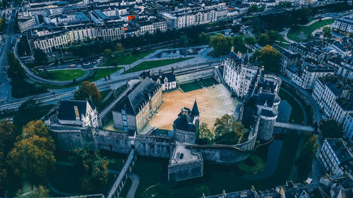 High angle view of bridge and buildings in city