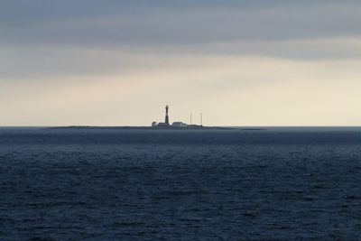 Lighthouse on  an island close to the sail route into oslo fjord in norway.