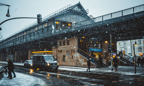 Cars on snow against sky