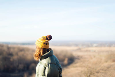 Woman looking at camera on field