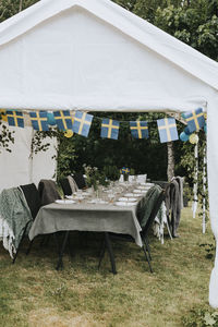 Gazebo with set table in garden