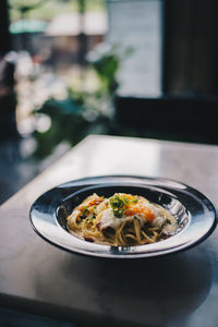 Close-up of pasta in bowl on table