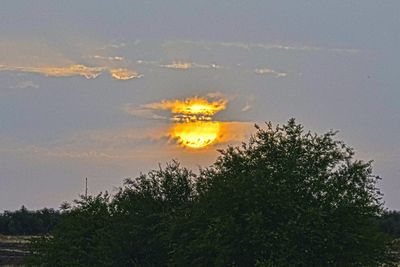 Scenic view of landscape at sunset