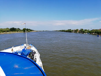 Scenic view of sea against blue sky