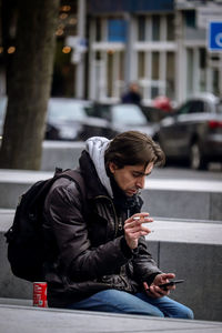 Young man using phone