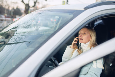 A woman in a car