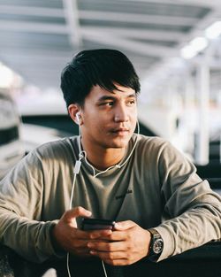 Young man using mobile phone