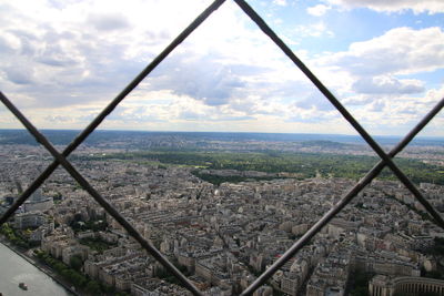 High angle view of cityscape against cloudy sky