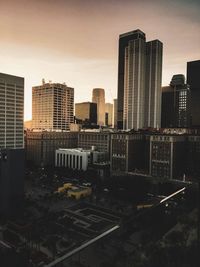 High angle view of buildings in city against sky