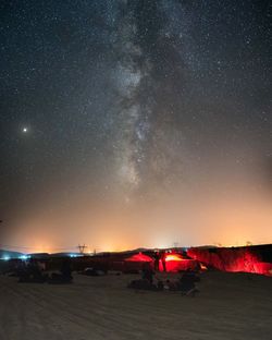 Scenic view of star field against sky at night
