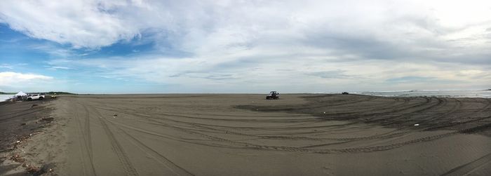 Scenic view of desert against sky