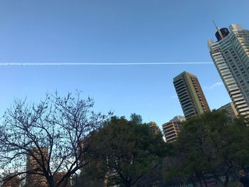 Low angle view of buildings against clear sky