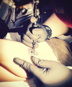 Cropped image of woman holding hands