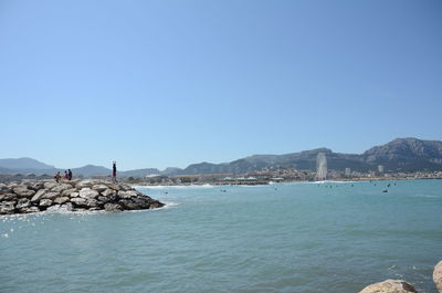 Scenic view of sea against clear sky