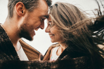 Close-up of young couple romancing