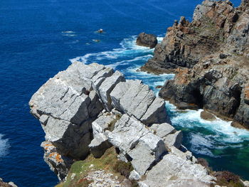 Scenic view of sea seen from rock formation