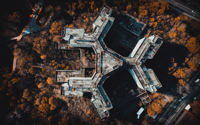 Aerial view of building by trees