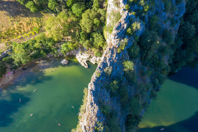 High angle view of natural arch over river