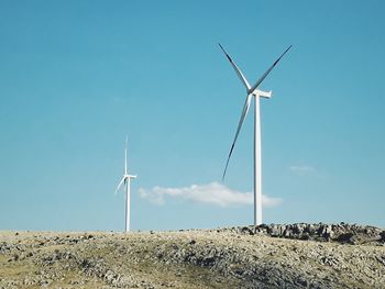 Wind turbines on field