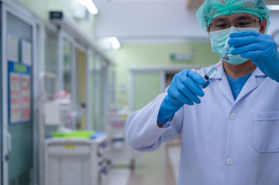 Full length of a man wearing mask