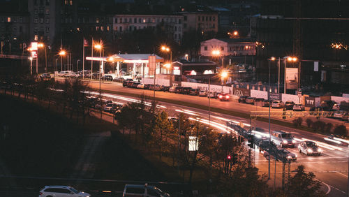 High angle view of light trails on road at night