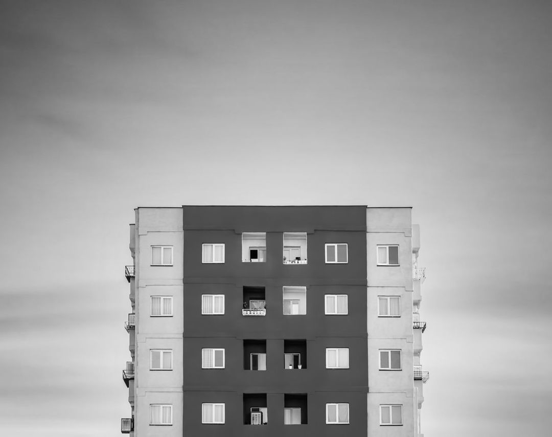 black and white, white, architecture, sky, monochrome, building exterior, building, built structure, monochrome photography, tower block, cloud, city, no people, apartment, copy space, nature, gray, window, residential district, line, outdoors, low angle view