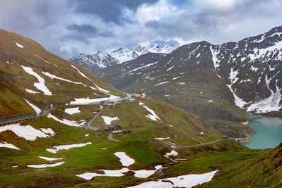 Scenic view of snowcapped mountains against sky