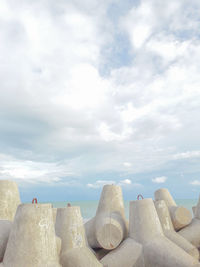 Panoramic view of land against cloudy sky