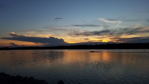 Scenic view of sea at sunset