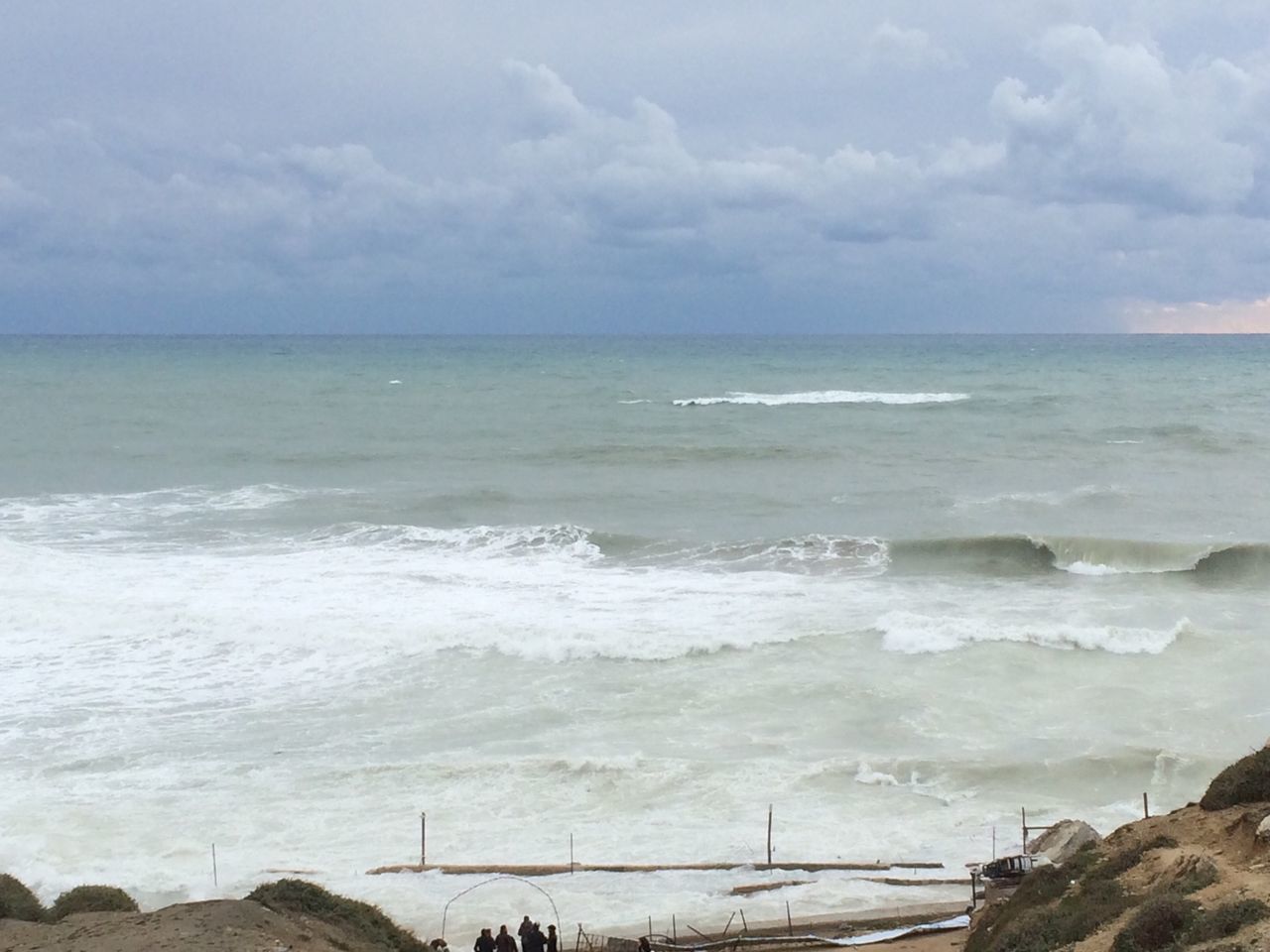 sea, horizon over water, water, sky, beach, shore, wave, scenics, cloud - sky, beauty in nature, tranquil scene, surf, tranquility, nature, cloudy, idyllic, cloud, sand, coastline, day