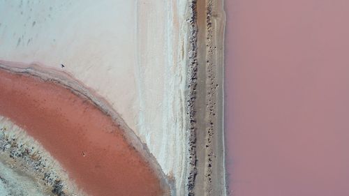 High angle view of old wall by sea