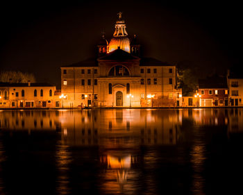 View of illuminated buildings at night